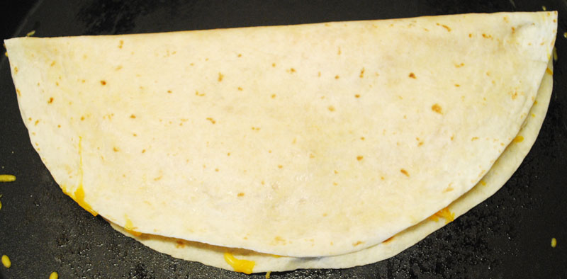 Simple and Quick Cheese Quesadillas - Fold Tortilla | Recipe Treasure