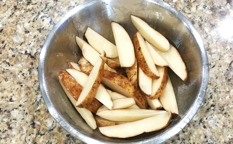 Oven-Baked Potato Wedges - Bowl - Recipe Treasure